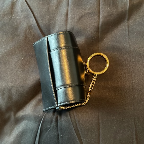Black leather with a golden chain Balenciaga keychain holder. Side pocket - Picture 3 of 3